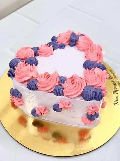 This is my hidden message heart cake. It looks like a beautiful vintage style cake from the outside, but has a secret message inside. It's a fun surprise for your partner or friends.