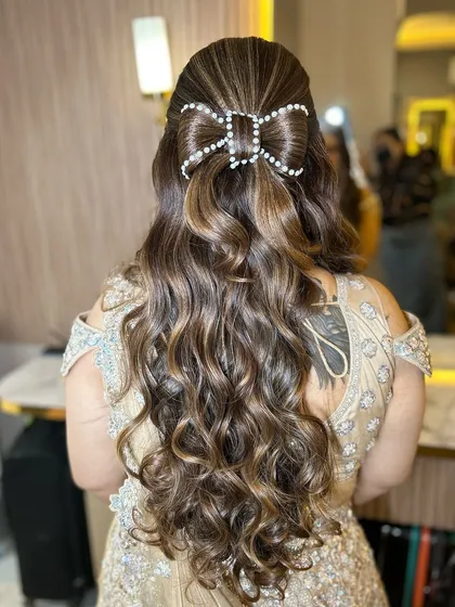 A back view of the stunning bow hairstyle.