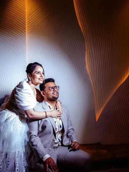 A stylish portrait using creative lighting to create wavy patterns of light. The unique effect adds an artistic and modern flair to this anniversary photo.