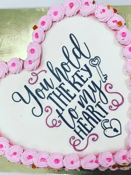 A heartfelt message on a sweet canvas. This heart-shaped cake with the message "You hold the key to my heart" is a perfect romantic gesture for Valentine's Day, an anniversary, or just because.