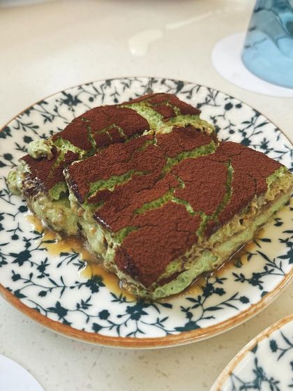 The tiramisu at Neighbors Goa had a unique presentation. Highlighting creative twists on classic desserts is a great way to showcase a cafe's personality.