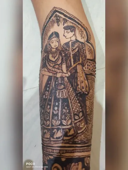 A highly detailed, realistic portrait of a couple, covering a large section of the arm. This style is for brides who want their henna to be a true work of art.