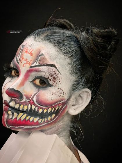 A different angle of the horror clown, showing the creepy, wide-eyed stare. This is not for the faint of heart.