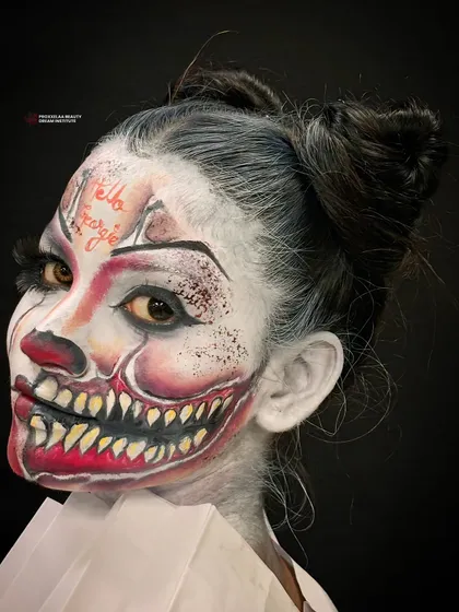 A different angle of the horror clown, showing the creepy, wide-eyed stare. This is not for the faint of heart.