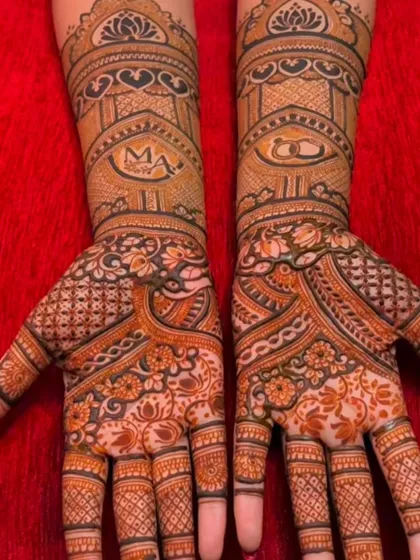 An intricate engagement design with the initials 'MA' and an engagement ring symbol woven into the pattern.
