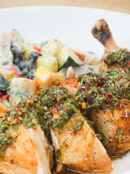 A Portuguese-Argentine Fusion: Frango de Padaria with Chimichurri: Frango de Padaria, or "bakery chicken," is a Portuguese classic. We pair this crispy-skinned roast chicken with a vibrant Argentine chimichurri sauce for a burst of fresh, tangy flavor.