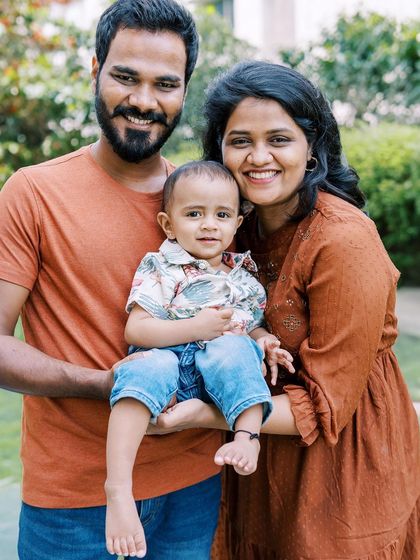 A happy family portrait after a cake smash session. The energy is high, and the smiles are genuine.