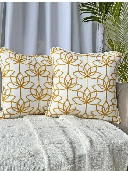Add a touch of elegance to your sofa with our premium lotus embroidery cushion cover. This piece combines traditional craftsmanship with a modern aesthetic, perfect for a stylish home.