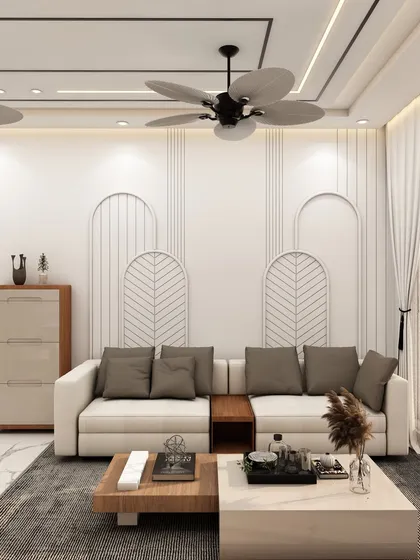 This living room design features a neutral palette with clean lines and arched wall details, creating a calm and sophisticated atmosphere. The layout is optimized for conversation and comfort.