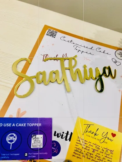 The "Saathiya" topper packaged with care instructions, ensuring it arrives ready for your special day.
