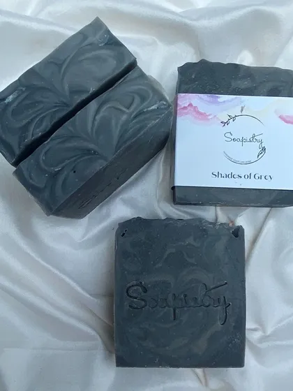 This is my Shades of Grey soap, a sophisticated bar with a complex scent of mint, lavender, sandalwood, and musk. It's a truly unique and grounding aroma.