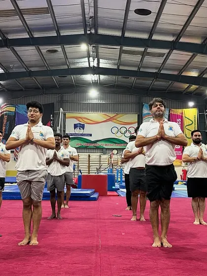 Gymnastics isn't just for kids. Our adult classes, like this special session for International Yoga Day, focus on building strength, flexibility, and finding a fun alternative to a boring gym routine.