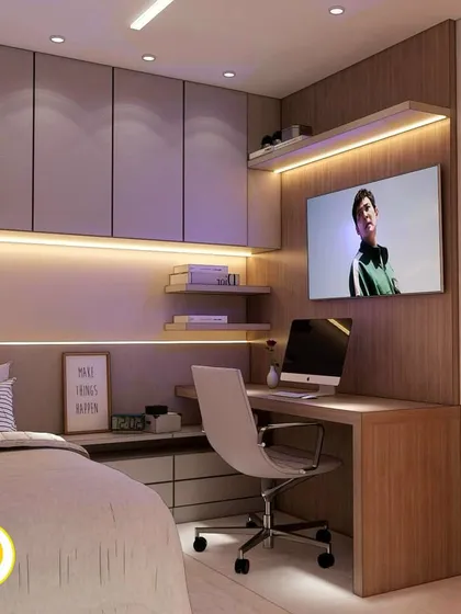 A close-up of the study area, showing the TV mounted on the wall and the well-organized desk space.