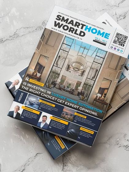 The cover of Smart Home World magazine, featuring a grand, double-height space from another project, with the Twin Villa feature inside.
