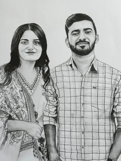 A charcoal paper drawing of a couple, size 14x16 inches. Using charcoal allows for deeper blacks and softer shading, which gives the portrait a distinct look.