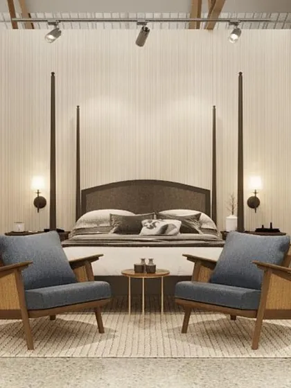 A bedroom vignette featuring a four-poster bed. By creating these complete room sets, the store allows customers to experience the furniture in a realistic and aspirational context.