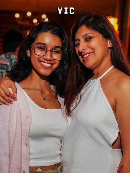 A mother and daughter enjoying the Christmas Eve party at The Bier Library. My goal is to create a welcoming atmosphere for all ages to celebrate together.