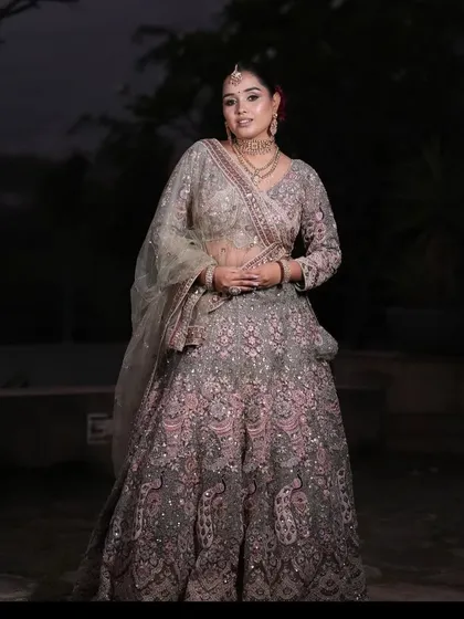 Another full-length view of the grey and pink lehenga, showing its elegant silhouette.