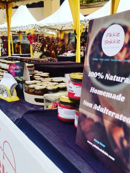 Our table setup at Phoenix Marketcity, with our "100% Natural, Homemade, Non Adulterated" sign clearly visible for all to see.