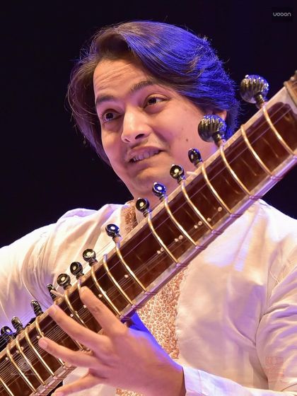 A close-up shot from the Kolkata concert, showing the detailed work on the sitar's frets. The beauty of classical music is often in the subtle details and ornaments.