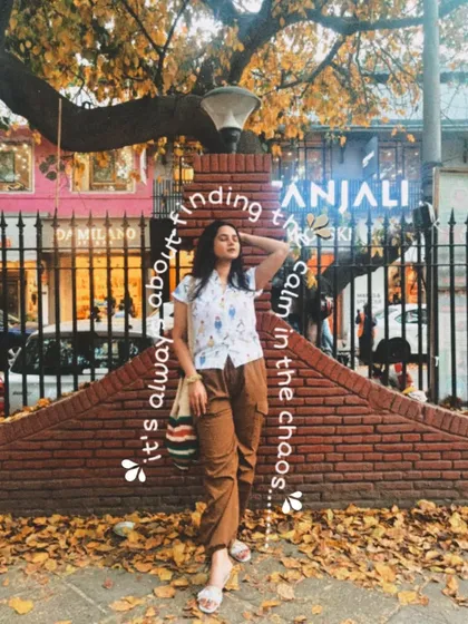 Finding the calm in the chaos of Delhi with a comfy and stylish outfit. This look, featuring cargo pants and a quirky shirt, is perfect for a day of exploring and shopping in Khan Market.