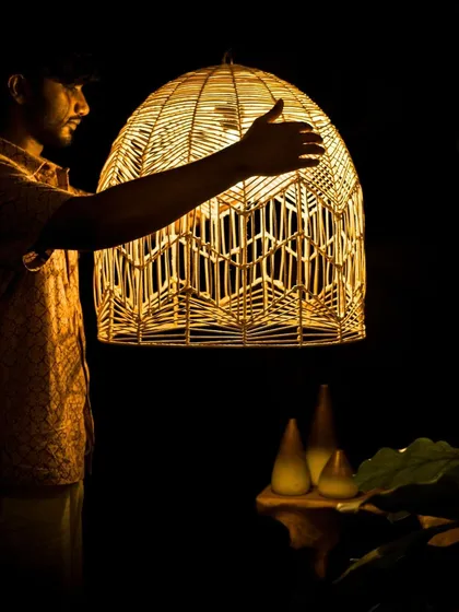 To give you a sense of scale, here I am with one of my larger, more intricate dome-shaped creations. Each piece is a labor of love, designed to be a significant, artful presence in your home or commercial space.