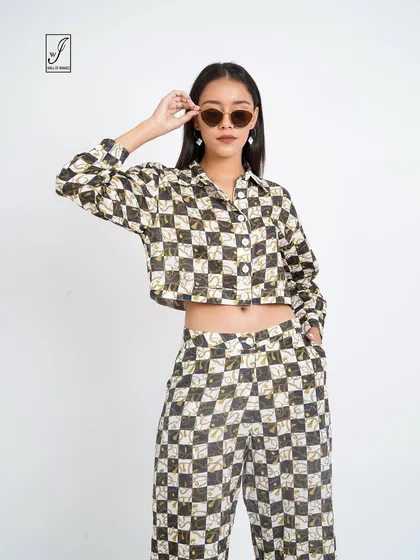 A cropped checkered shirt and matching pants, demonstrating a trendy and coordinated look.