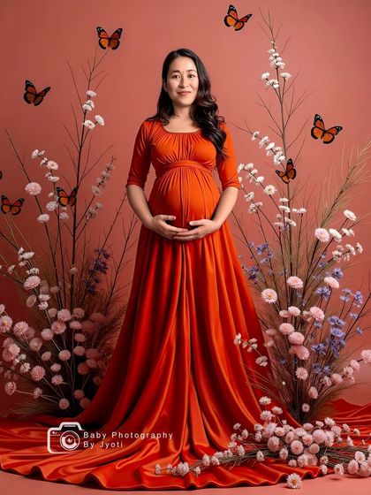 A vibrant and artistic portrait in a burnt orange gown. The floral arrangement and added butterfly effects create a whimsical and lively image.