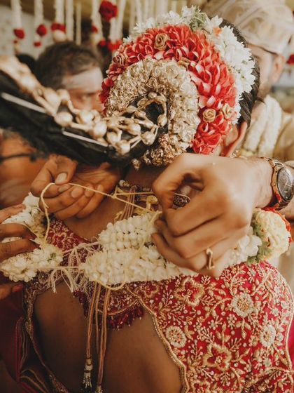The tying of the Mangalsutra, one of the most sacred and emotional moments of a Hindu wedding ceremony.