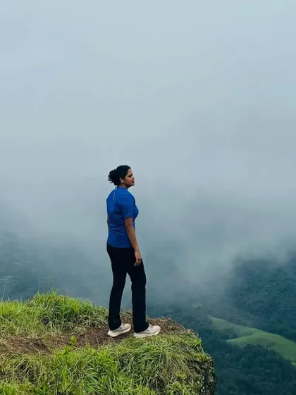A solitary moment on the Gangadikal trek, overlooking the vast expanse of the Kudremukh range.