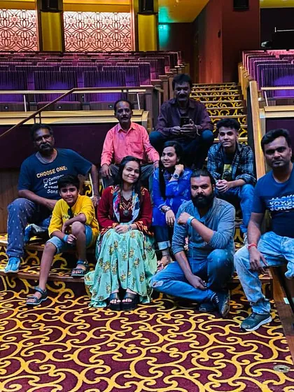 Our team taking a moment to rest in the beautiful theatre at NMACC after setting up the lights and sound. A lot of work goes on behind the scenes to make the show perfect.