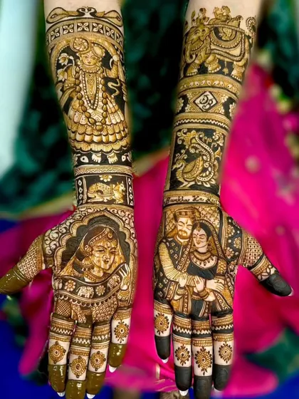 A royal themed mehendi with portraits of the couple. The arms feature a depiction of Shrinathji and other traditional Rajasthani motifs.