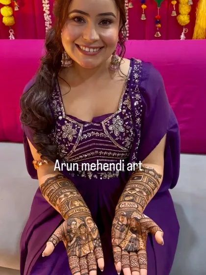 A happy bride showing off her personalized portrait mehendi. The joy on her face is my biggest reward.