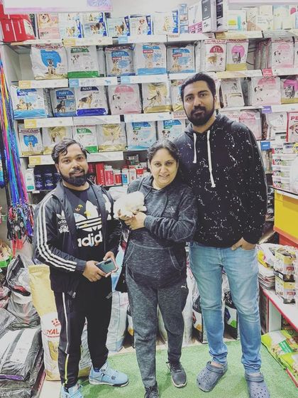 I always try to give people more than they expect. This family was delighted with their tiny new Maltese puppy, and I was happy to guide them at my associated pet shop.