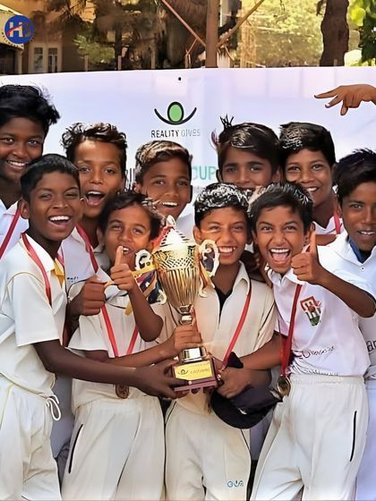 The pure joy of victory. We partner with NGOs like Reality Gives to empower children through sports, providing them with mentorship, training, and the chance to compete.