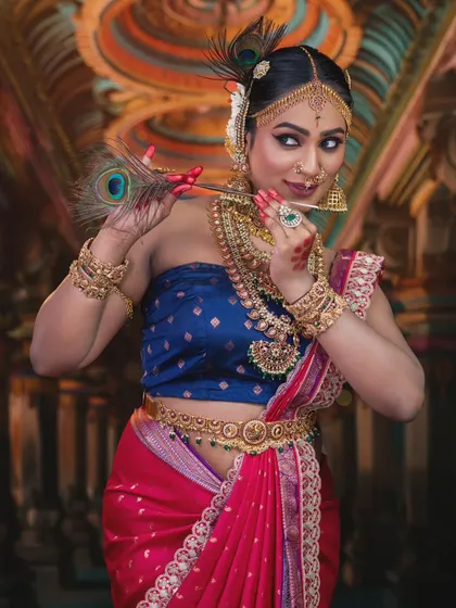 This traditional look, complete with a peacock feather, highlights the versatility of my temple jewellery for creative and themed shoots.