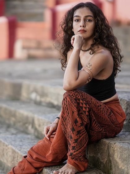 A portrait that captures a sense of inner balance and authentic presence. My practice is a journey of self-discovery, and I aim to inspire others to find their own unique expression of movement.