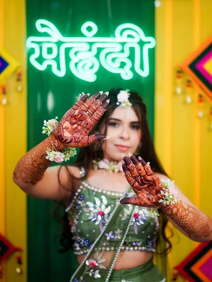 A playful pose showing off the deep color of the mehndi stain. My henna is guaranteed to give you this beautiful, dark result.