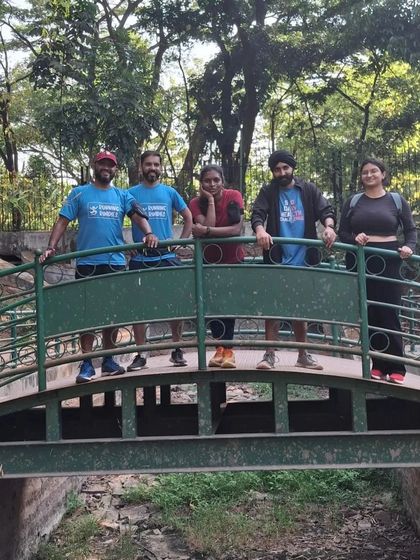 Posing on one of the charming bridges in Cubbon Park. The park offers a beautiful, green escape in the heart of the city, making it one of our favorite spots for a Sunday run.