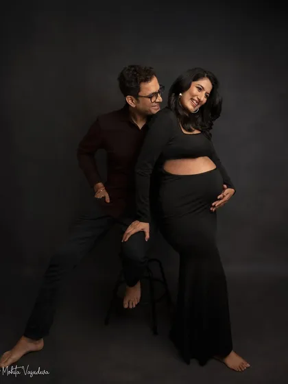 A playful and happy moment from the same session. His smile, her laugh, it's a perfect capture of their dynamic.