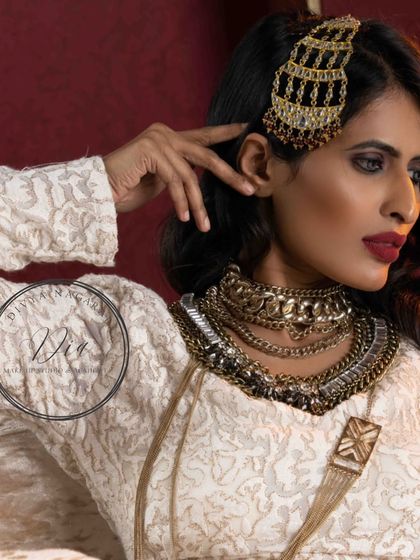 A state of mind. This creative, glamorous look combines bold makeup with unique hair accessories and jewellery for a truly artistic expression.