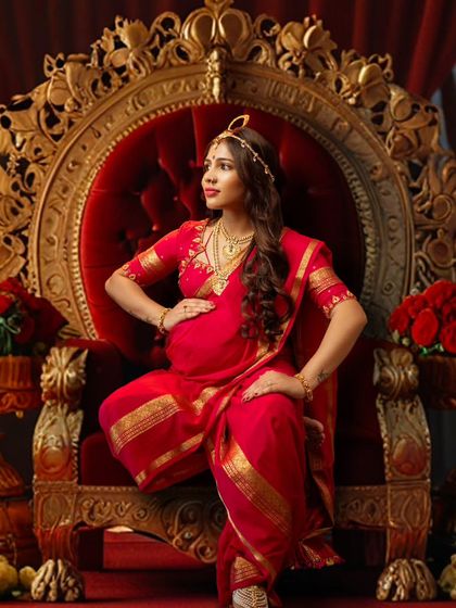 This isn’t just a photo, it’s a celebration of motherhood, strength, and timeless beauty. A queen in her own right, she sits gracefully, embracing her journey.