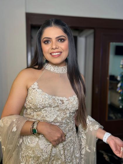 A close-up of the client, her makeup looking fresh and perfect for the party.