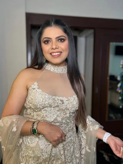 A close-up of the client, her makeup looking fresh and perfect for the party.