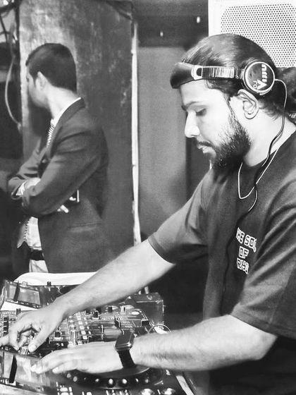 These shots capture me in my element, from different angles and at various events. Each one is a glimpse into my life as a music maker, focused on the craft and connecting with the crowd.