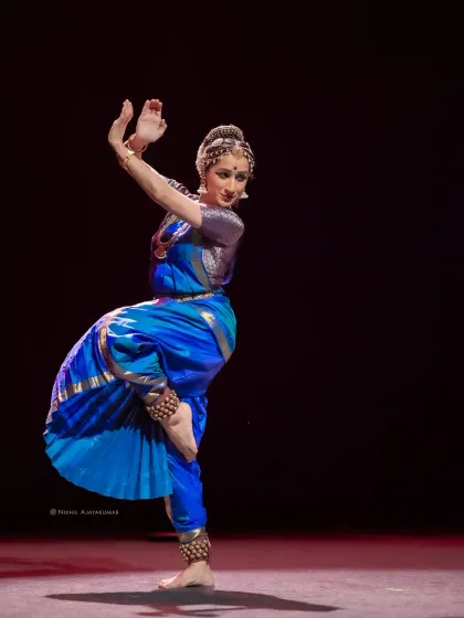 This is another angle of a classic Kuchipudi pose, highlighting the control and balance required to hold such a position with grace.