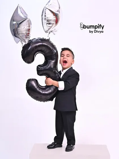 Turning three is a big deal! I love matching the energy of a child's milestone birthday with a fun, dynamic studio photoshoot. This little man is celebrating in style, full of personality and excitement.