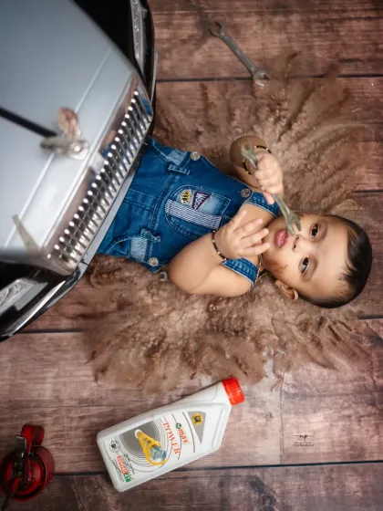 A creative overhead shot of our tiny mechanic at work. I love finding unique angles to tell a story and make the photos more dynamic.