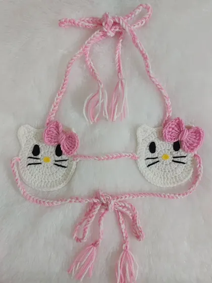 This was a fun custom order for a Hello Kitty bikini top. I can create character-themed pieces like this to match your unique style.