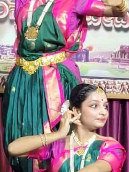 A lovely moment captured during the Navaratri program.